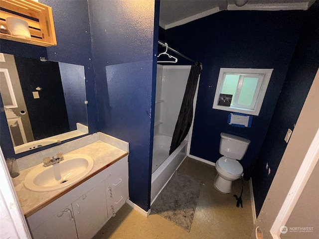 bathroom featuring vanity, toilet, and curtained shower