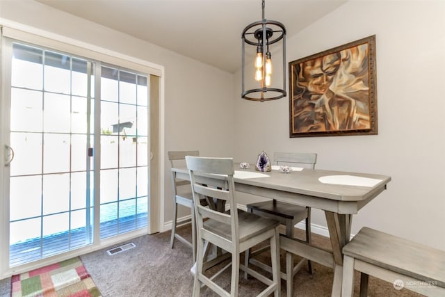 dining room featuring carpet floors