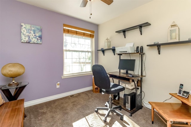 carpeted home office with ceiling fan