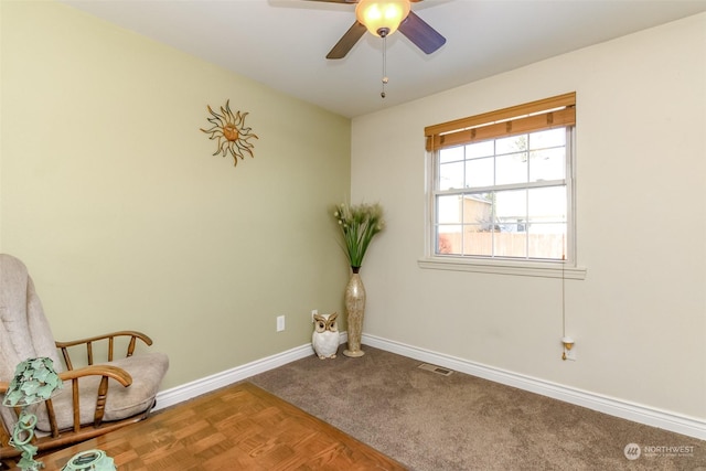 unfurnished room featuring carpet floors and ceiling fan