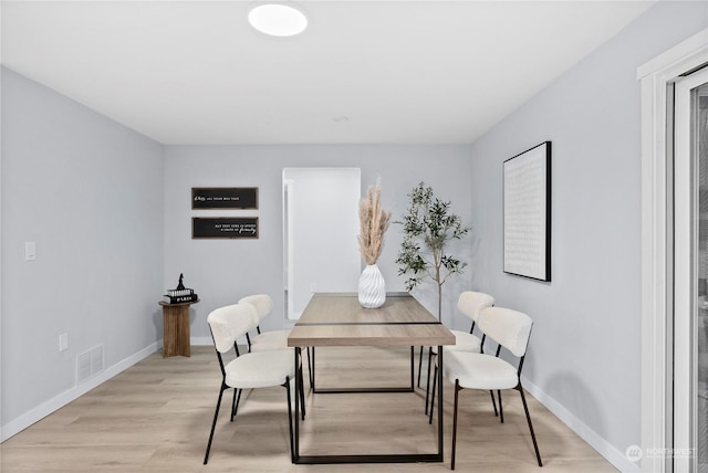 dining area featuring light hardwood / wood-style flooring