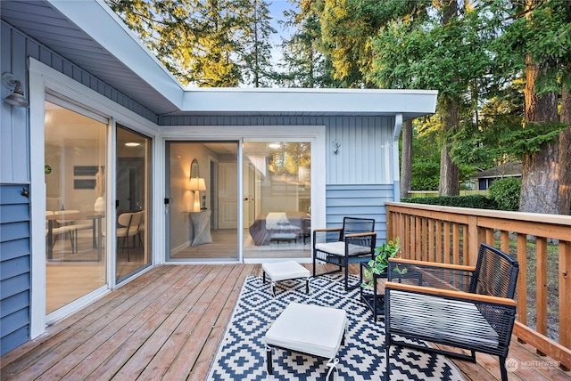 wooden deck with outdoor lounge area