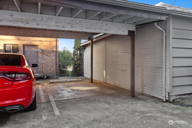 exterior space featuring a carport