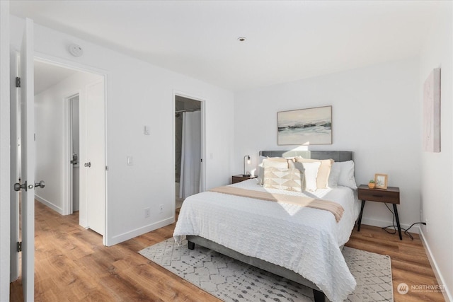 bedroom featuring light wood-type flooring