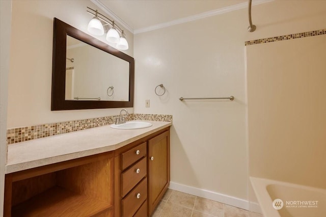 bathroom with ornamental molding, tile patterned flooring, vanity, and backsplash