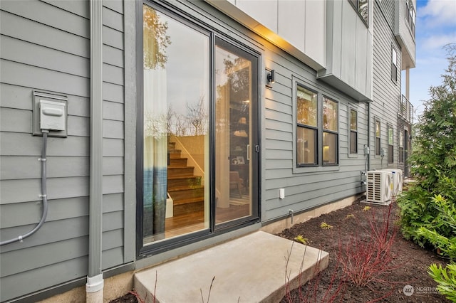 property entrance featuring ac unit