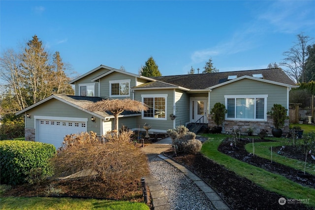 view of front of property with a garage