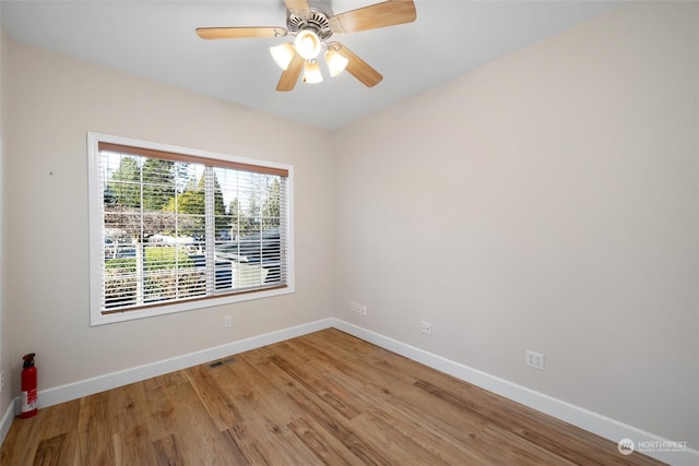 unfurnished room featuring wood-type flooring and ceiling fan