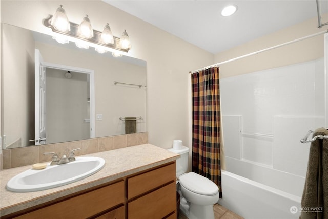 full bathroom featuring shower / bathtub combination with curtain, vanity, and toilet