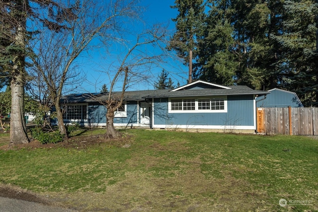 single story home with a front yard