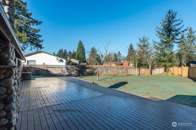 deck featuring a yard and central air condition unit