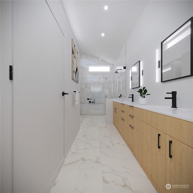 bathroom with vanity, shower with separate bathtub, and vaulted ceiling