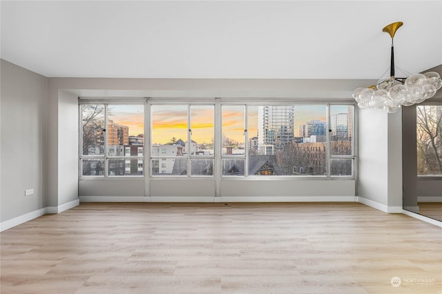 interior space featuring a healthy amount of sunlight and light hardwood / wood-style floors