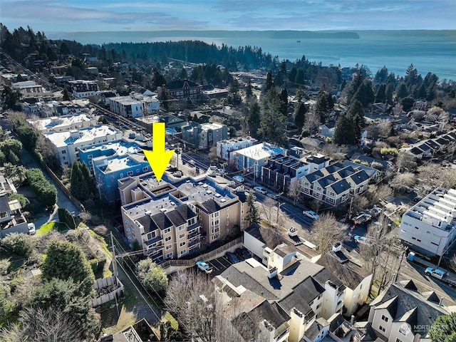 birds eye view of property featuring a water view