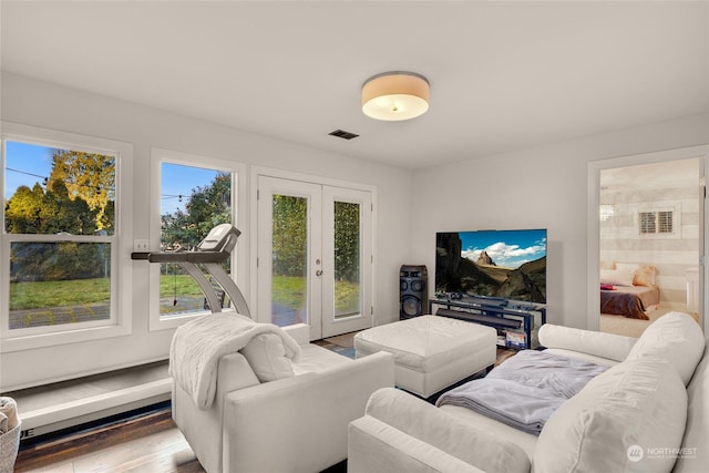 living room featuring french doors and wood-type flooring