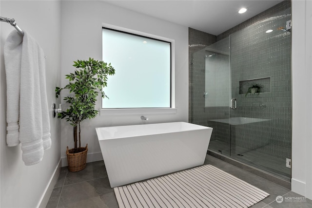 bathroom with plus walk in shower and tile patterned floors