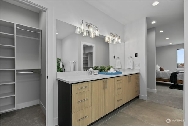 bathroom with vanity and tile patterned flooring