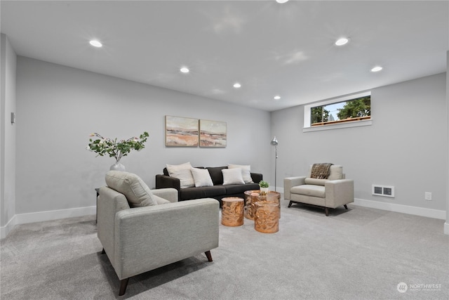 living room featuring light colored carpet