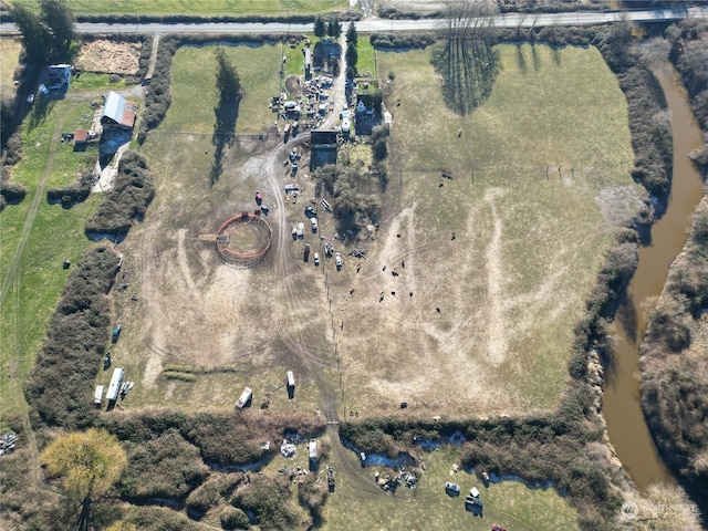 birds eye view of property featuring a rural view