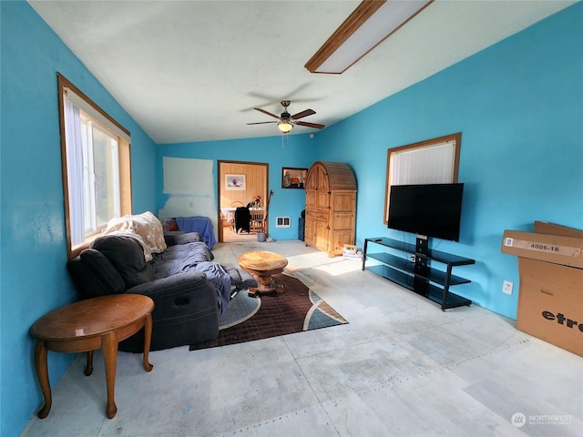 living room featuring lofted ceiling and ceiling fan