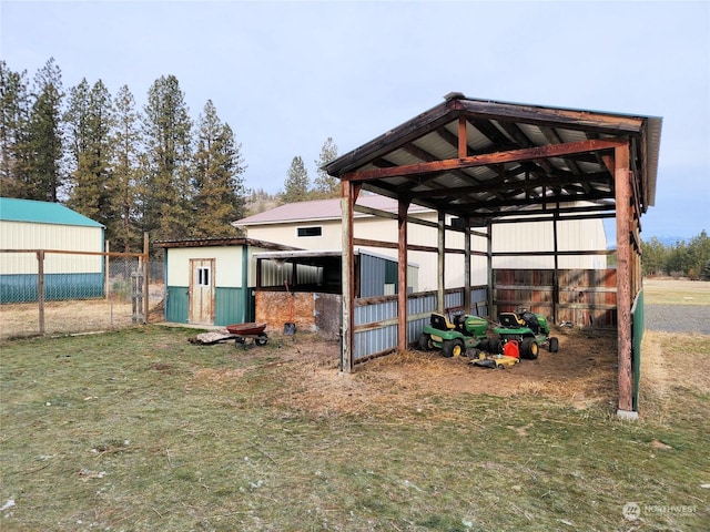 view of outbuilding with a lawn