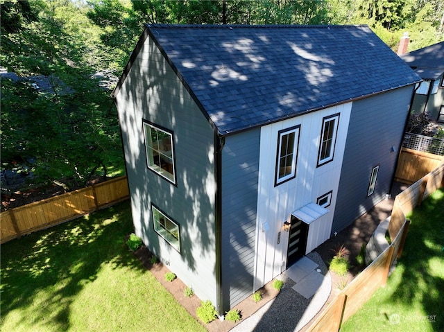 view of outdoor structure with a yard