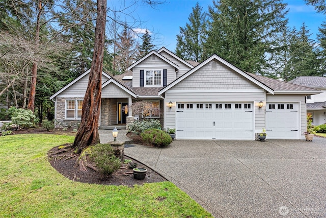 view of front facade featuring a garage and a front yard