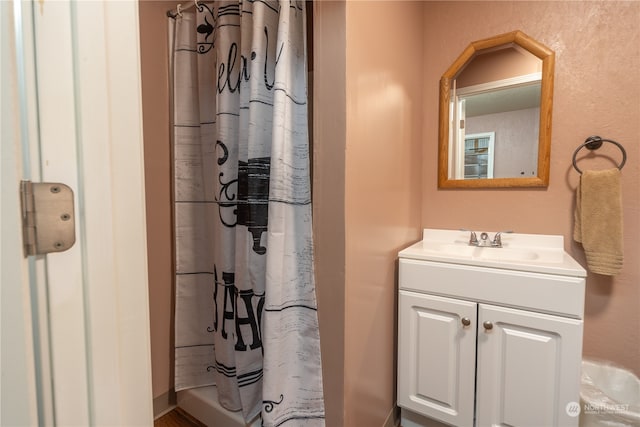 bathroom with vanity and a shower with curtain