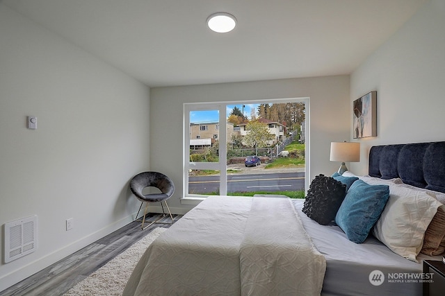 bedroom featuring hardwood / wood-style floors