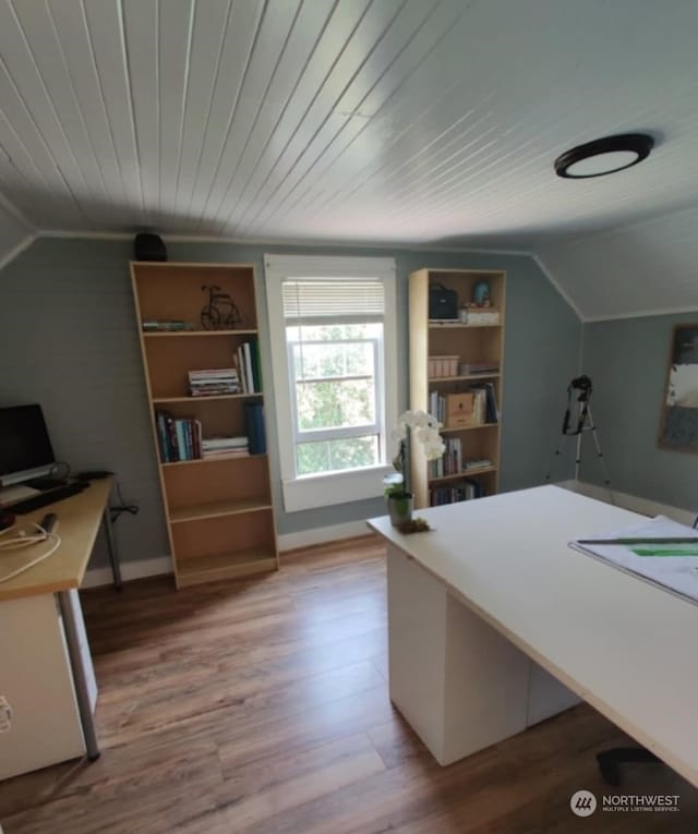 home office with wood-type flooring, vaulted ceiling, and wood ceiling