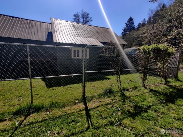 back of property with a yard