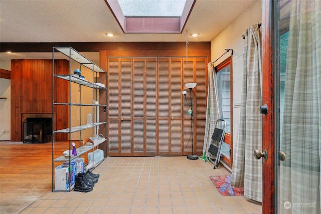 misc room featuring a textured ceiling and french doors