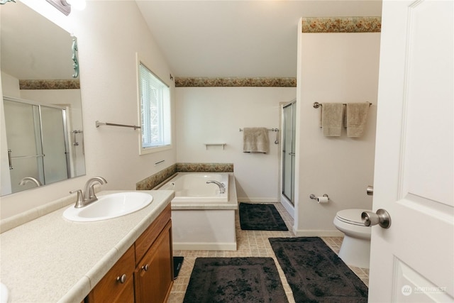 bathroom featuring tile patterned floors, plus walk in shower, and vanity