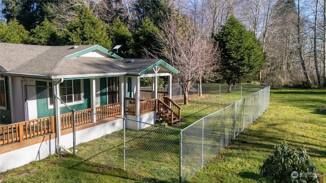 view of home's community with a yard