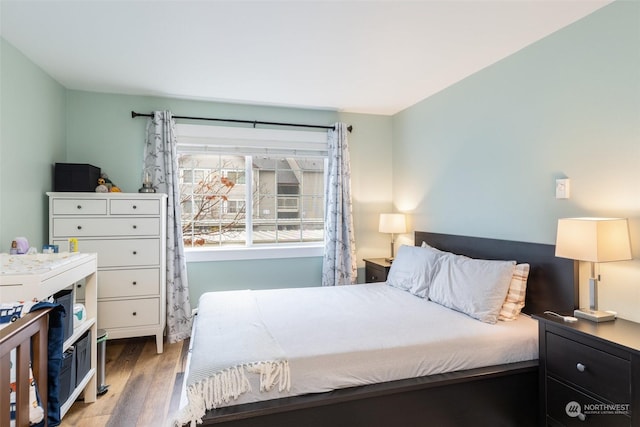 bedroom featuring light wood-type flooring