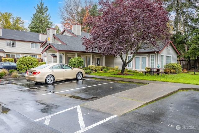 exterior space featuring a front lawn