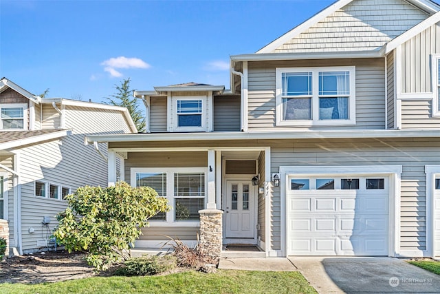 view of front of property featuring a garage