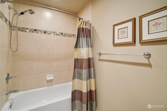 bathroom with shower / bathtub combination with curtain