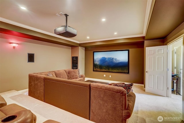 home theater with recessed lighting, ornamental molding, baseboards, and light colored carpet