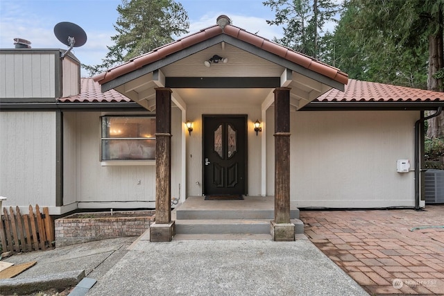 doorway to property with central AC