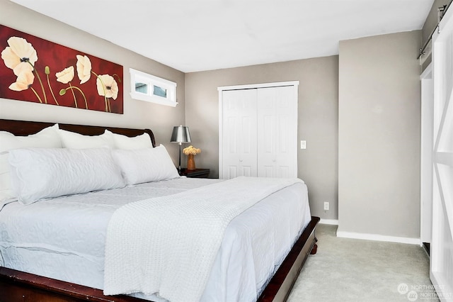 carpeted bedroom with a closet