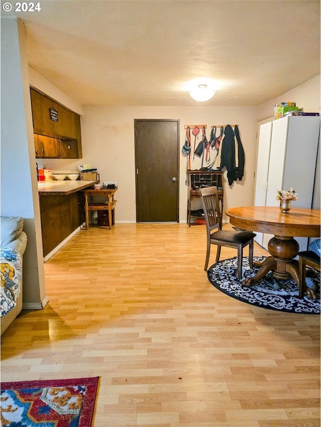 dining space featuring light hardwood / wood-style floors