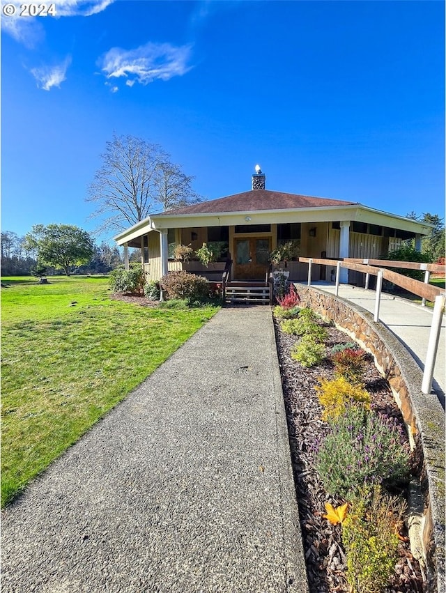 view of front of house with a front yard