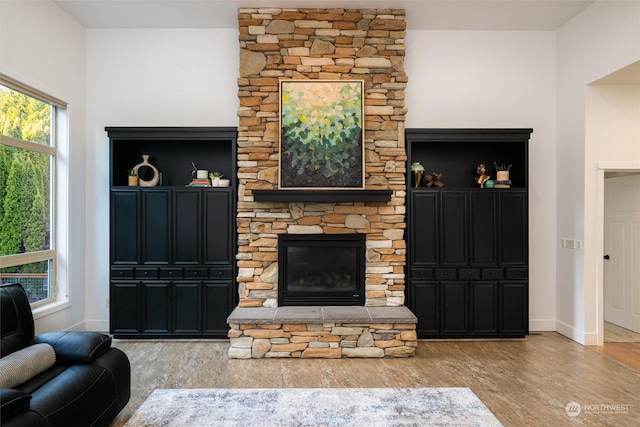 living room featuring a fireplace and light hardwood / wood-style floors