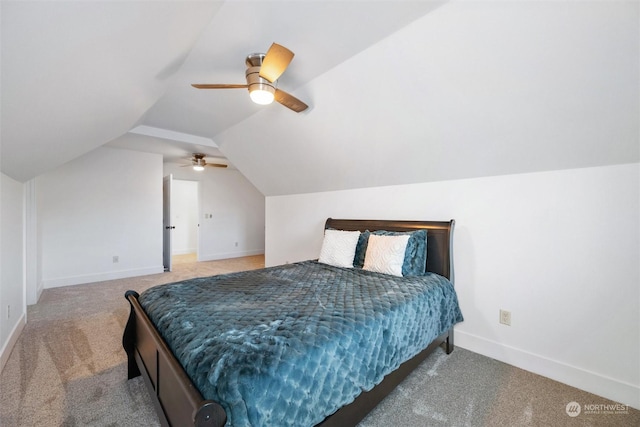 bedroom featuring ceiling fan, lofted ceiling, and carpet floors