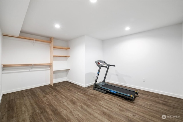 exercise area featuring dark hardwood / wood-style flooring