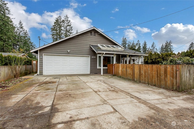 view of front of property with a garage