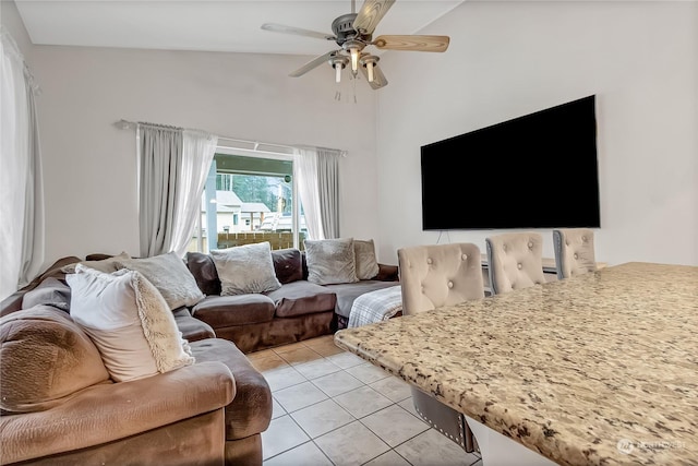 tiled living room featuring ceiling fan