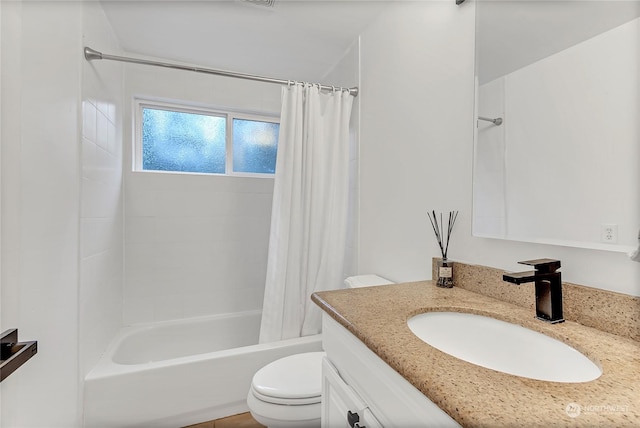 full bathroom featuring vanity, shower / tub combo, and toilet