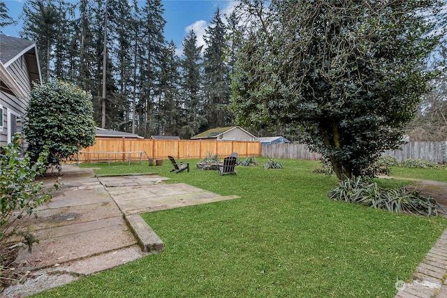 view of yard featuring a patio and a trampoline